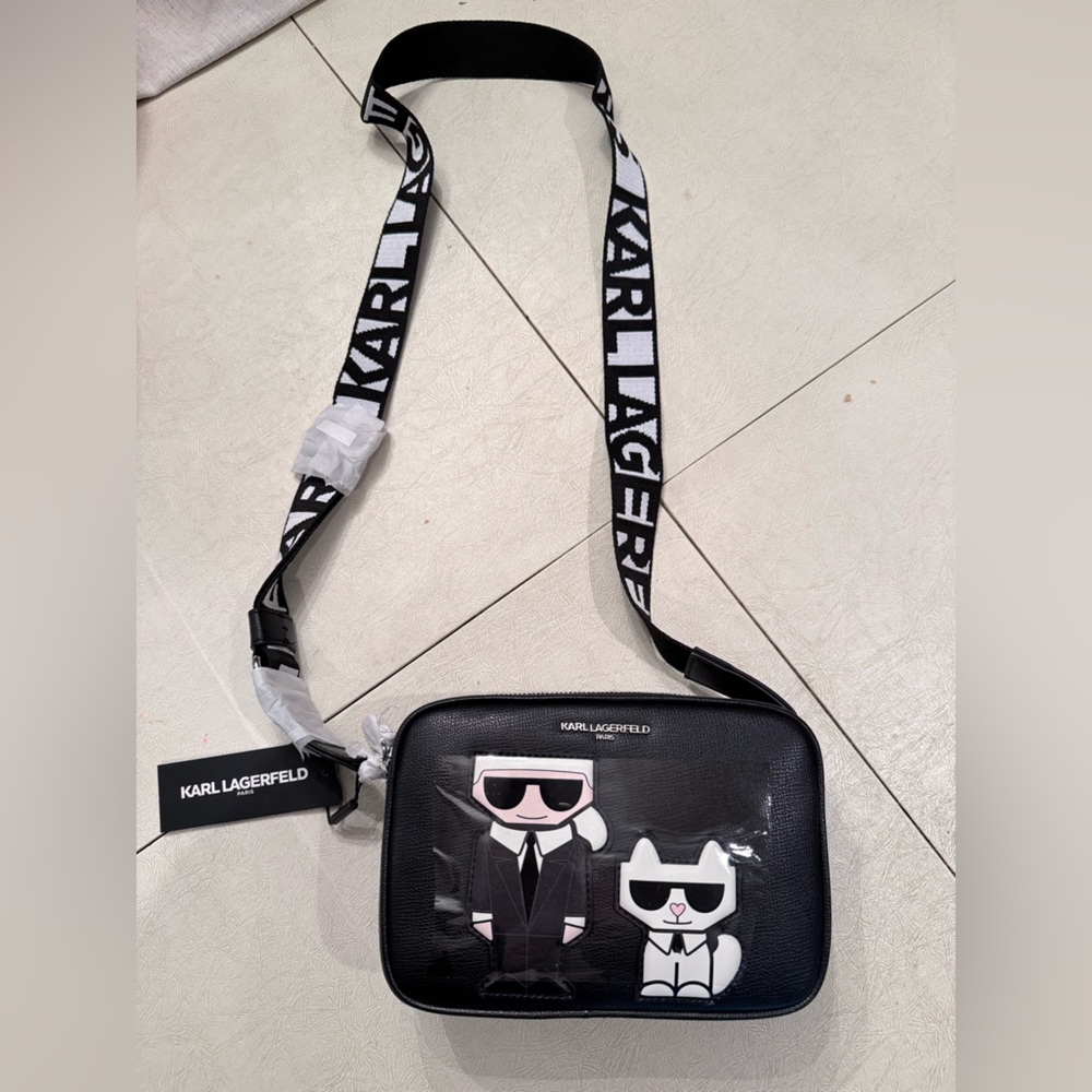 Karl Lagerfeld Black Messenger Bag with Graphic Design of Lagerfeld and his cat